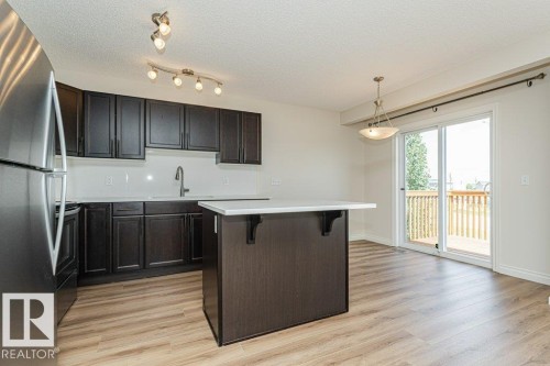 #32 445 Brintnell Bv Nw, Edmonton, AB - Indoor Photo Showing Kitchen With Upgraded Kitchen