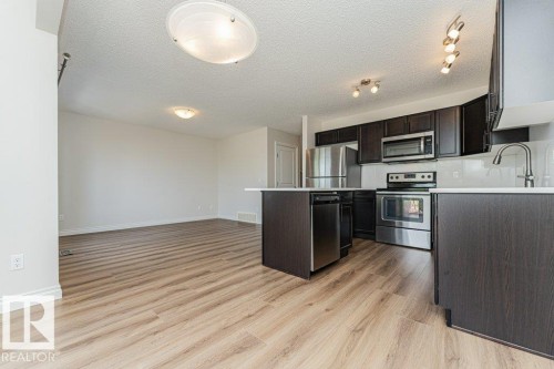 #32 445 Brintnell Bv Nw, Edmonton, AB - Indoor Photo Showing Kitchen With Stainless Steel Kitchen