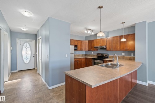 #209 802 12 St, Cold Lake, AB - Indoor Photo Showing Kitchen With Double Sink