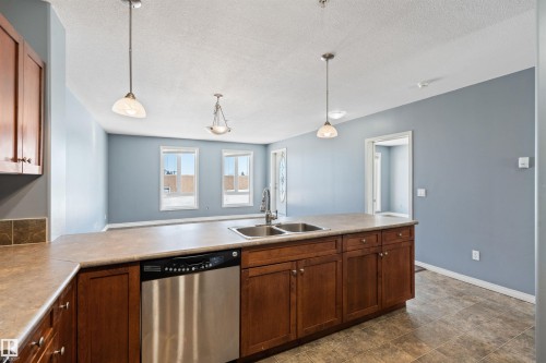 #209 802 12 St, Cold Lake, AB - Indoor Photo Showing Kitchen With Double Sink