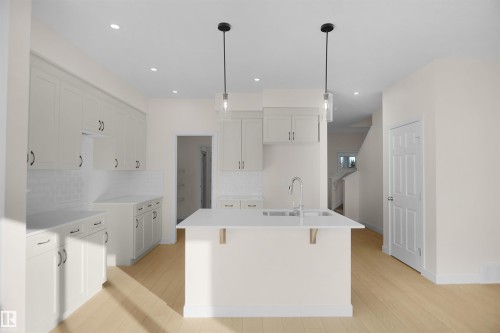 33 Foxtail Road, Fort Saskatchewan, AB - Indoor Photo Showing Kitchen With Double Sink With Upgraded Kitchen