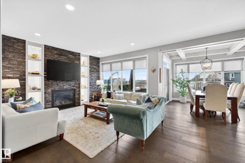 9036 24 Avenue Sw, Edmonton, AB - Indoor Photo Showing Living Room With Fireplace
