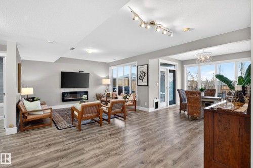 9036 24 Avenue Sw, Edmonton, AB - Indoor Photo Showing Other Room With Fireplace