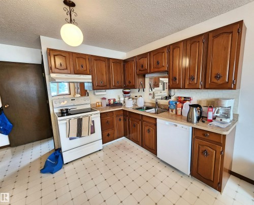 5118 49 Avenue, St. Paul Town, AB - Indoor Photo Showing Kitchen With Double Sink