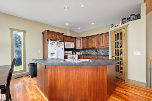 48003 Rr271, Rural Leduc County, AB - Indoor Photo Showing Kitchen With Double Sink