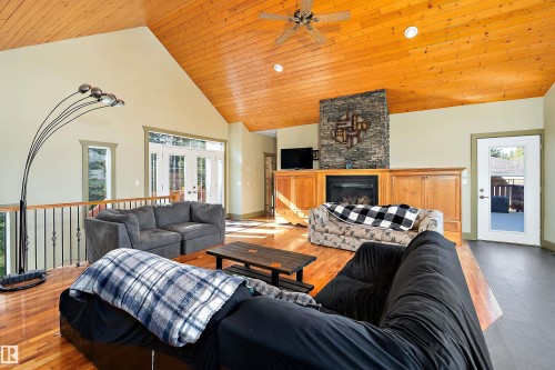 48003 Rr271, Rural Leduc County, AB - Indoor Photo Showing Living Room With Fireplace