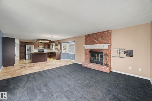 90 Dufferin Street, St. Albert, AB - Indoor Photo Showing Living Room With Fireplace