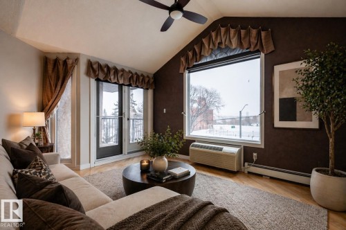 #304 9336 Jasper Av Nw, Edmonton, AB - Indoor Photo Showing Living Room