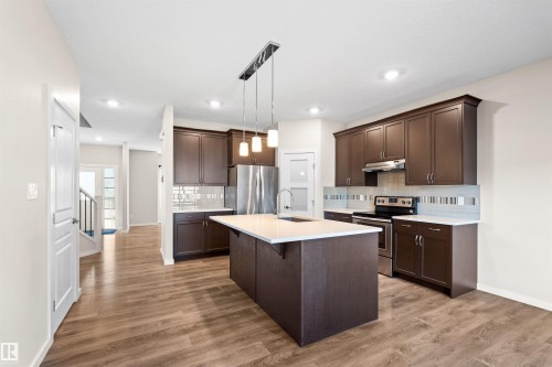 16040 11 Avenue Sw, Edmonton, AB - Indoor Photo Showing Kitchen With Upgraded Kitchen