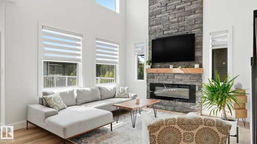 19 Holt Cove, Spruce Grove, AB - Indoor Photo Showing Living Room With Fireplace