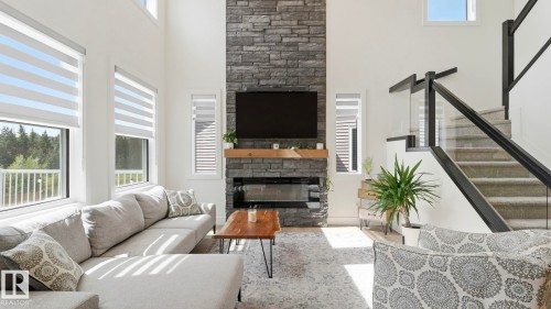 19 Holt Cove, Spruce Grove, AB - Indoor Photo Showing Living Room With Fireplace