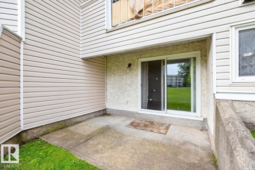 Ground-level concrete patio with direct outdoor access - #5 11265 31 Av Nw, Edmonton, AB - Outdoor With Exterior