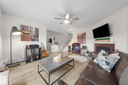 10518 84 Avenue Nw, Edmonton, AB - Indoor Photo Showing Living Room With Fireplace