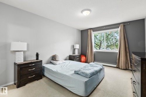 #132 50 Woodsmere Close, Fort Saskatchewan, AB - Indoor Photo Showing Bedroom