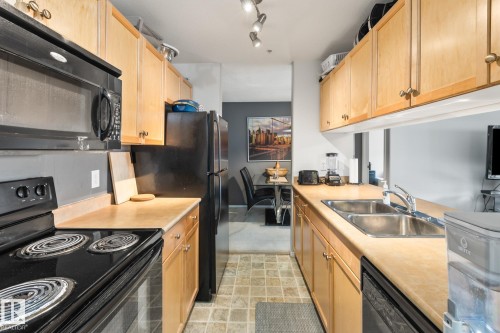#132 50 Woodsmere Close, Fort Saskatchewan, AB - Indoor Photo Showing Kitchen With Double Sink