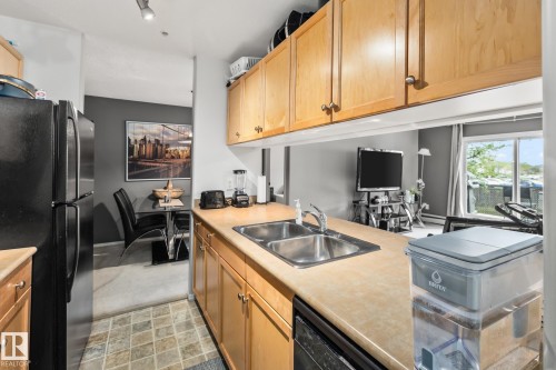 #132 50 Woodsmere Close, Fort Saskatchewan, AB - Indoor Photo Showing Kitchen With Double Sink