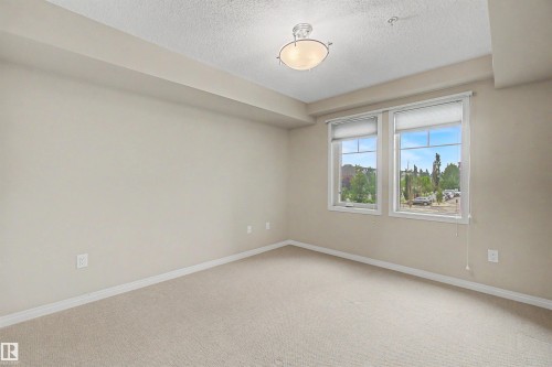 #215 4450 Mccrae Av Nw, Edmonton, AB - Indoor Photo Showing Other Room