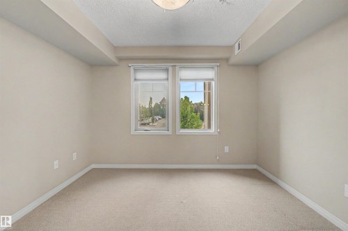 #215 4450 Mccrae Av Nw, Edmonton, AB - Indoor Photo Showing Other Room