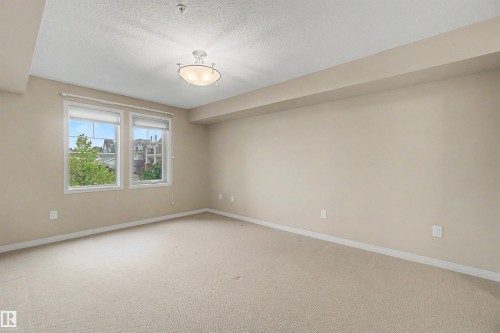 #215 4450 Mccrae Av Nw, Edmonton, AB - Indoor Photo Showing Other Room