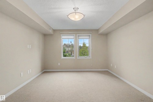 #215 4450 Mccrae Av Nw, Edmonton, AB - Indoor Photo Showing Other Room