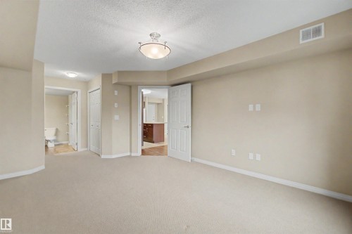 #215 4450 Mccrae Av Nw, Edmonton, AB - Indoor Photo Showing Other Room