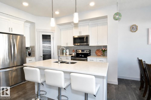 560 Sturtz Link, Leduc, AB - Indoor Photo Showing Kitchen With Double Sink With Upgraded Kitchen