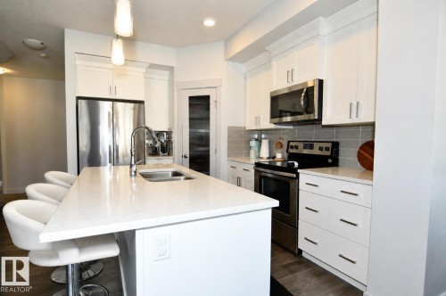 560 Sturtz Link, Leduc, AB - Indoor Photo Showing Kitchen With Double Sink
