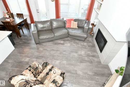 560 Sturtz Link, Leduc, AB - Indoor Photo Showing Living Room With Fireplace