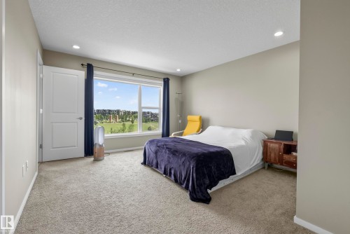 #10 1075 Rosenthal Bv Nw, Edmonton, AB - Indoor Photo Showing Bedroom