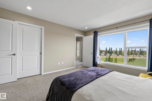 #10 1075 Rosenthal Bv Nw, Edmonton, AB - Indoor Photo Showing Bedroom
