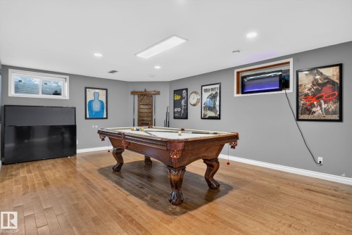 Recreation room featuring hardwood flooring and recessed lighting - 50336 Range Road 280, Rural Leduc County, AB - Indoor Photo Showing Other Room