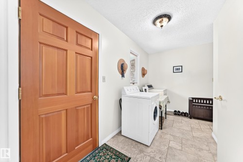 #24 25507 Twp Road 512 A, Rural Parkland County, AB - Indoor Photo Showing Laundry Room