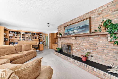 #24 25507 Twp Road 512 A, Rural Parkland County, AB - Indoor Photo Showing Living Room With Fireplace