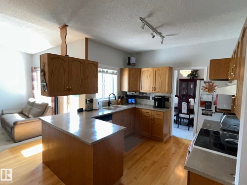 4014 Champagne Drive, Athabasca Town, AB - Indoor Photo Showing Kitchen With Double Sink