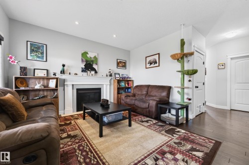 58 Woodbridge Link, Fort Saskatchewan, AB - Indoor Photo Showing Living Room With Fireplace