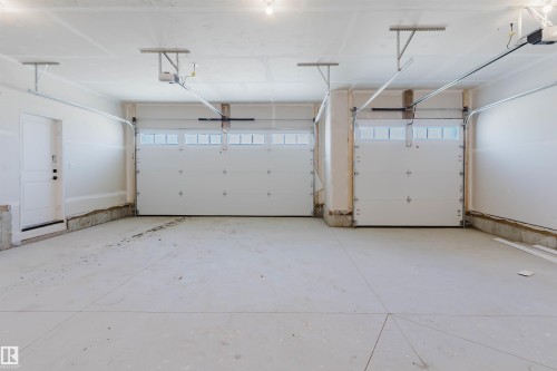3327 Chernowski Way Sw, Edmonton, AB - Indoor Photo Showing Garage