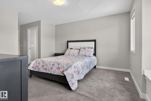 7341 Armour Crescent Sw, Edmonton, AB - Indoor Photo Showing Bedroom