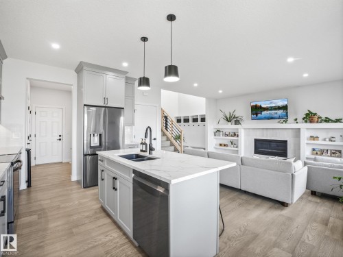 34 Edgefield Way, St. Albert, AB - Indoor Photo Showing Kitchen With Fireplace With Double Sink With Upgraded Kitchen