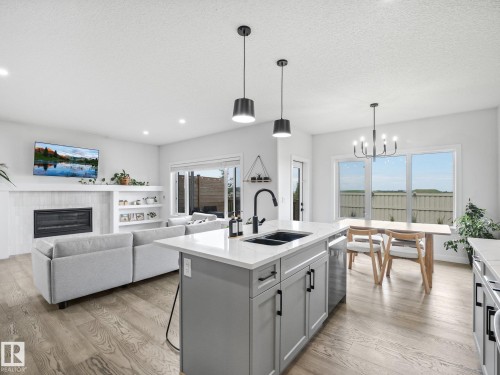 34 Edgefield Way, St. Albert, AB - Indoor Photo Showing Kitchen With Fireplace With Double Sink With Upgraded Kitchen