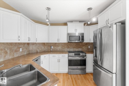 65 Ashby Gardens, Spruce Grove, AB - Indoor Photo Showing Kitchen With Double Sink