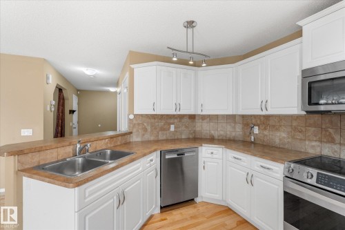 65 Ashby Gardens, Spruce Grove, AB - Indoor Photo Showing Kitchen With Double Sink