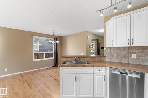 65 Ashby Gardens, Spruce Grove, AB - Indoor Photo Showing Kitchen With Double Sink
