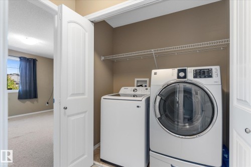 65 Ashby Gardens, Spruce Grove, AB - Indoor Photo Showing Laundry Room