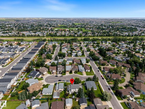 Aerial perspective showcasing a residential neighborhood with a mix of detached homes and townhouses - 10032 173 Avenue Nw, Edmonton, AB - Outdoor With View
