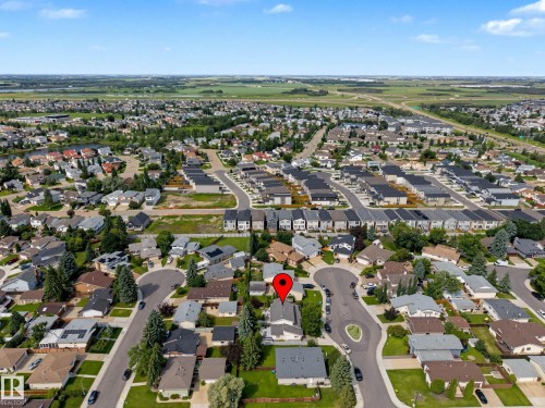 Aerial view of a suburban neighborhood featuring numerous residential properties - 10032 173 Avenue Nw, Edmonton, AB - Outdoor With View
