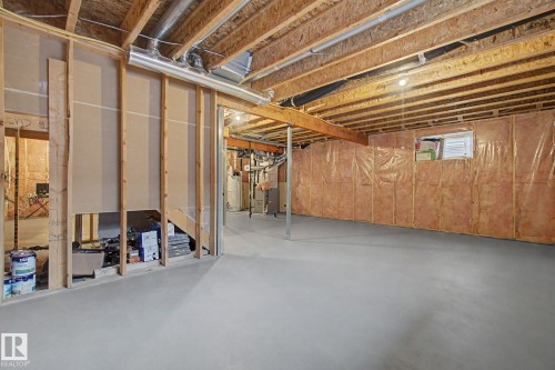Unfinished basement presenting exposed wood framing, concrete flooring, and insulated walls - 6016 10 Avenue Sw, Edmonton, AB - Indoor Photo Showing Basement
