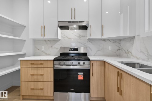 15728 9 Street Ne, Edmonton, AB - Indoor Photo Showing Kitchen With Double Sink With Upgraded Kitchen
