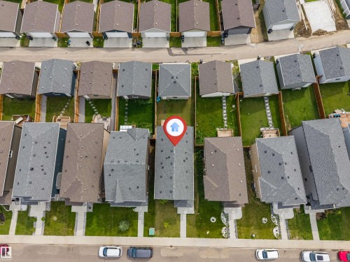 Aerial perspective showcasing a residential street with multiple properties - 6075 180 Avenue Nw, Edmonton, AB - Other