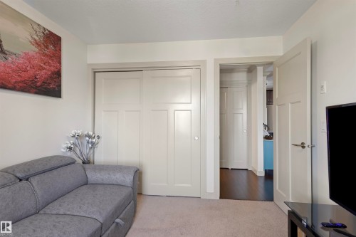 #301 16235 51 St Nw, Edmonton, AB - Indoor Photo Showing Living Room