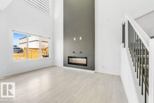 5140 23 Avenue Sw, Edmonton, AB - Indoor With Fireplace